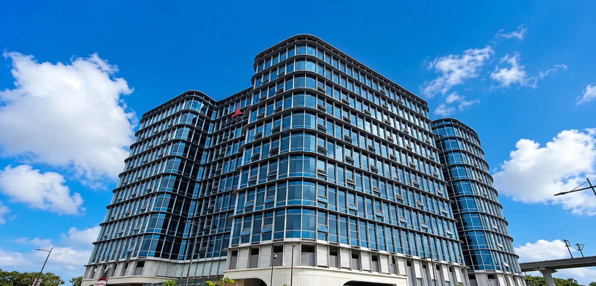 Elite Building Solutions — Fintech Tower curtain wall execution